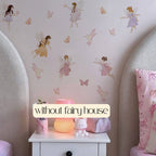 Children's room with fairy wall decals and a small table with toys, labeled 'without fairy house'.